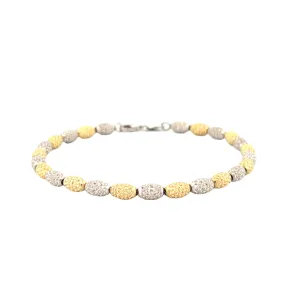 14K Two-Tone Gold Diamond Cut Oval Ball Bracelet