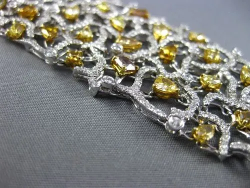 ESTATE EXTRA LARGE 17.10CT WHITE & FANCY INTENSE MULTI DIAMOND 18K GOLD BRACELET