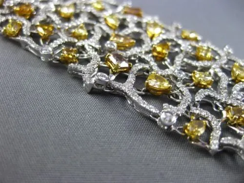 ESTATE EXTRA LARGE 17.10CT WHITE & FANCY INTENSE MULTI DIAMOND 18K GOLD BRACELET