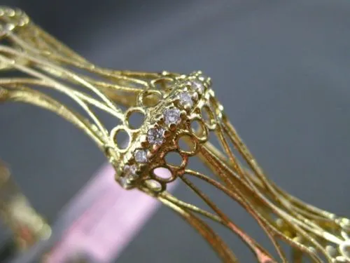 ESTATE WIDE .65CT DIAMOND 14KT YELLOW GOLD OPEN FILIGREE BAMBOO BANGLE BRACELET