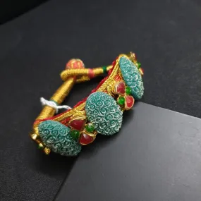 JP539 - Green carved stone kundan pochi